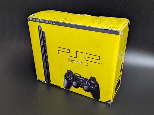Console comme neuve ps2 - console, slim